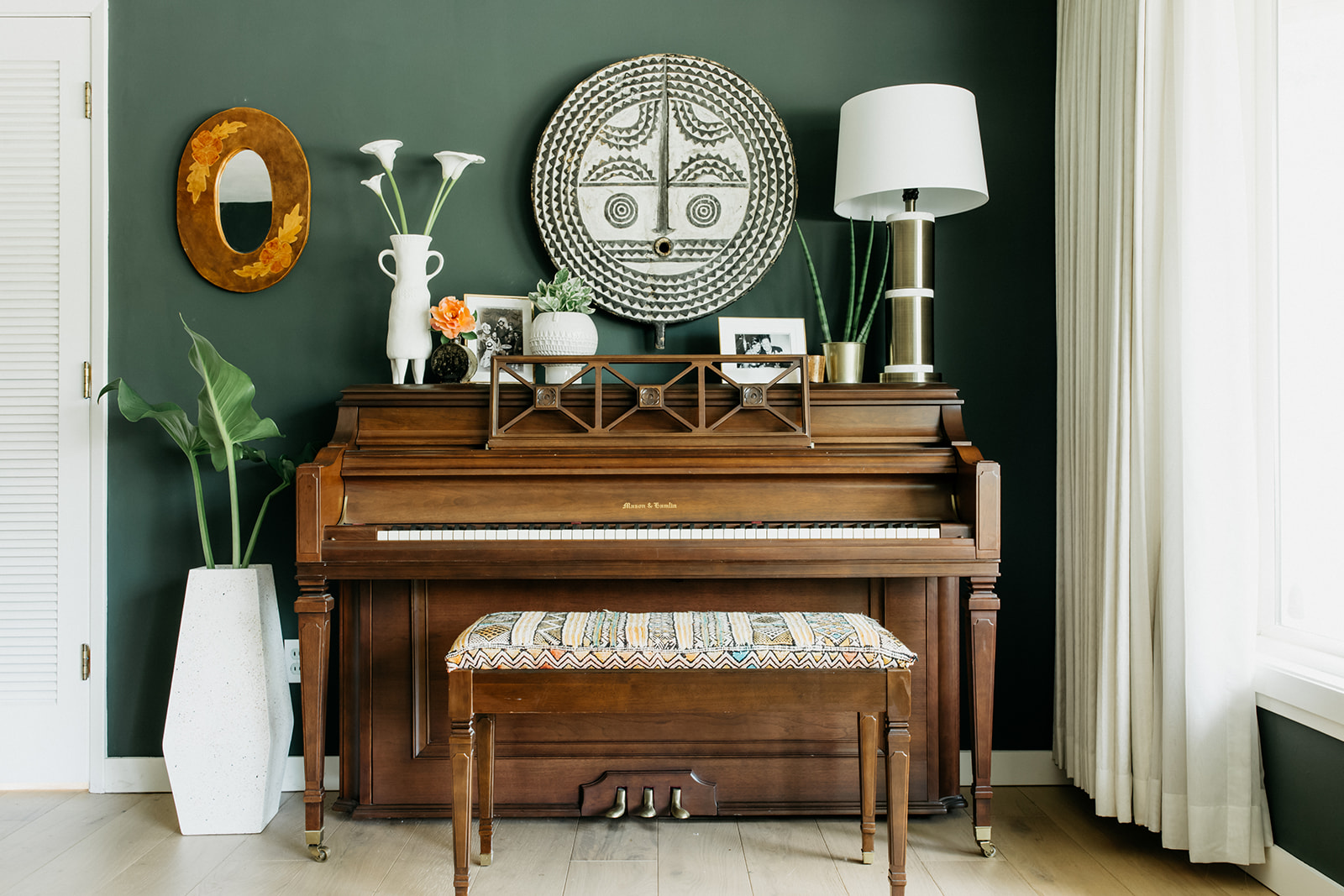 A moody vintage dining room interior design project by Studio Plumb