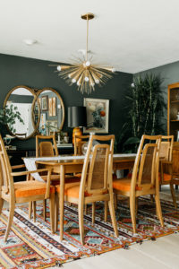 A moody vintage dining room interior design project by Studio Plumb