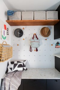 An midcentury modern mudroom bath laundry room interior design project by Studio Plumb
